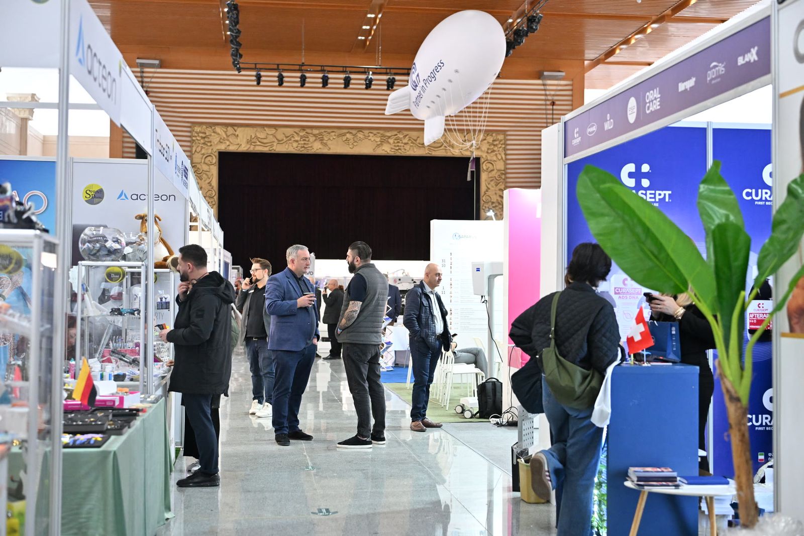 An exhibition aisle lined with stands