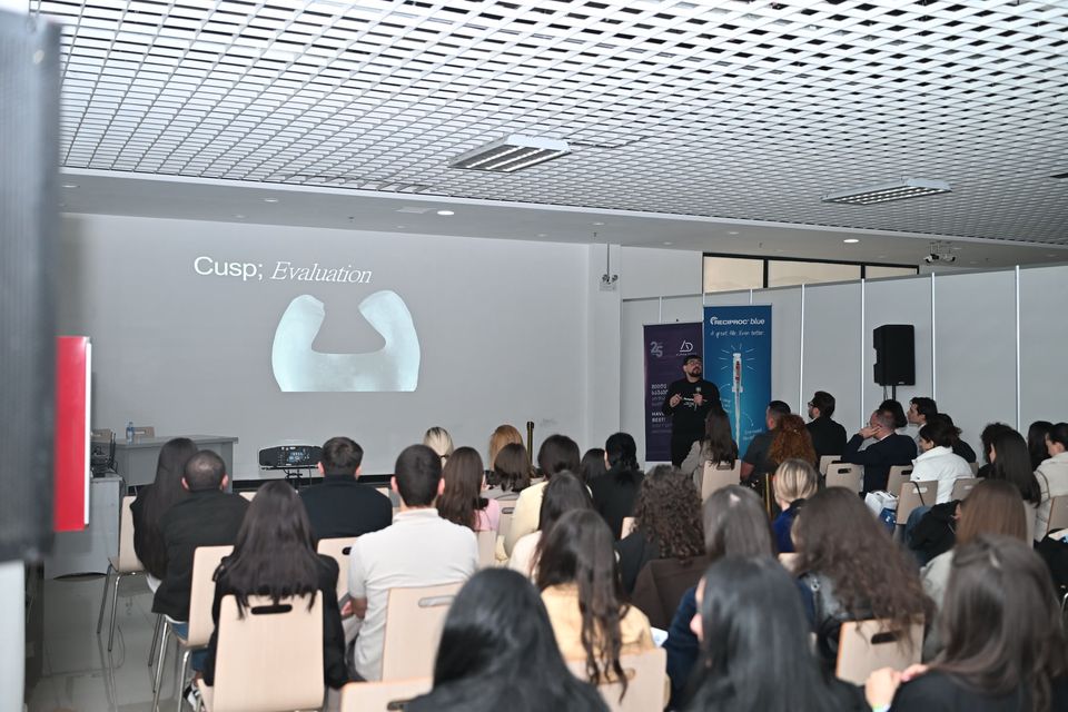 A lecture in progress in the conference hall