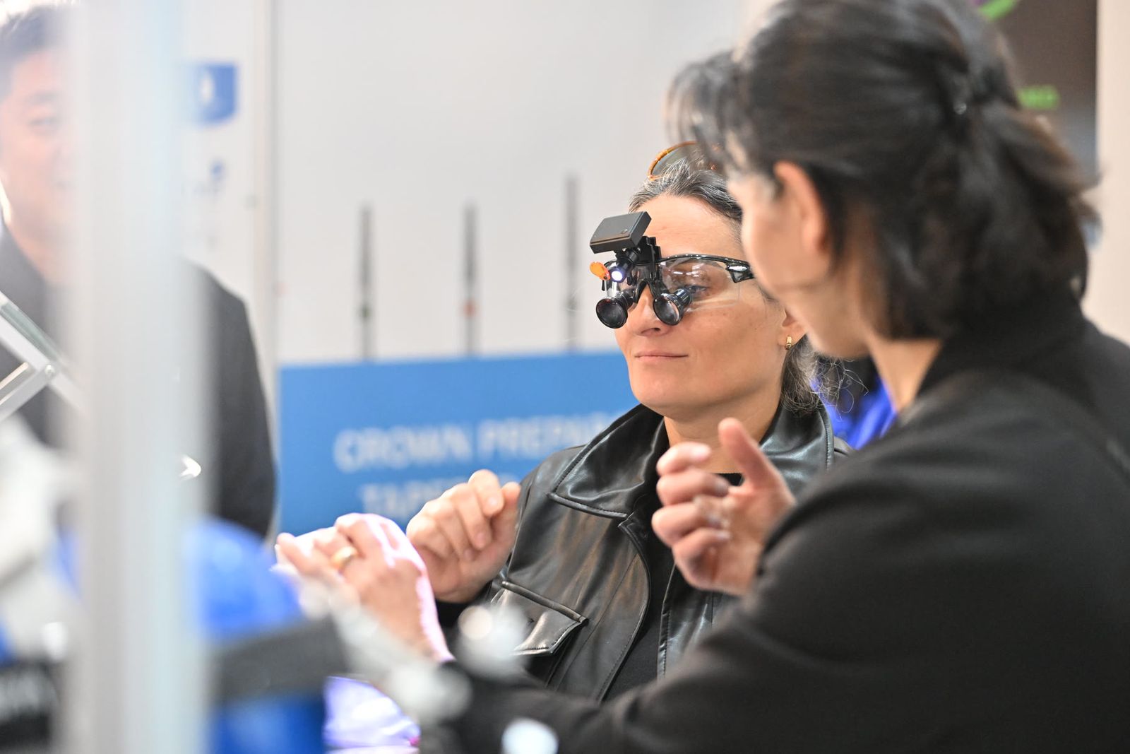 Trying on dental magnifying loupes