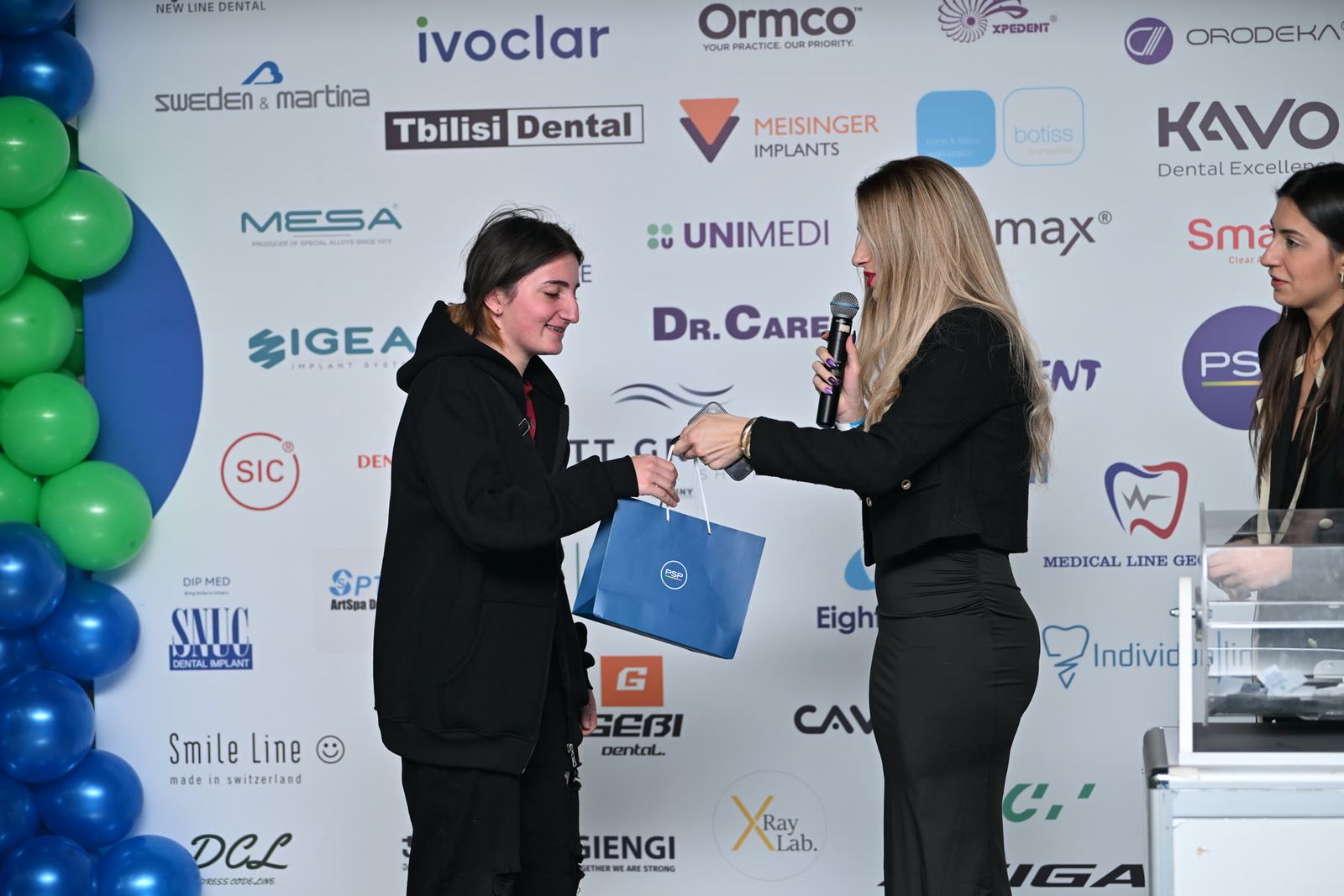 A prize being handed out on stage